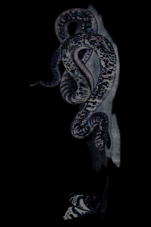Ornate Dragon Relief Sculpture on Black Background