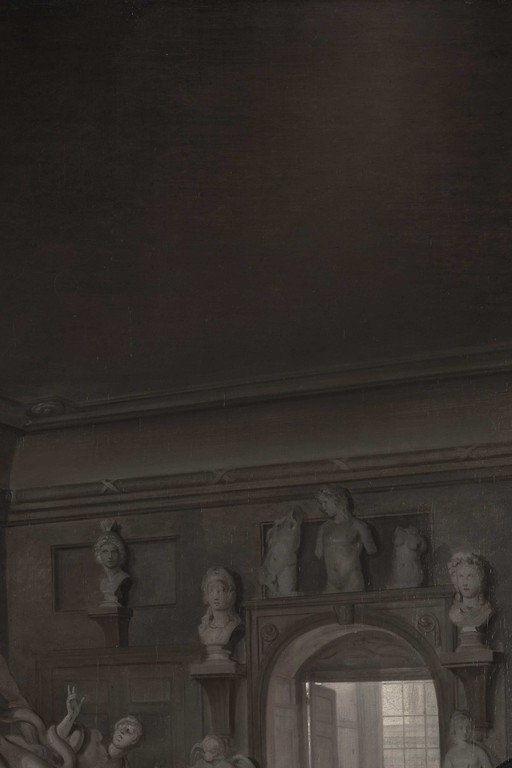 Classical marble busts and statuary in elegant interior