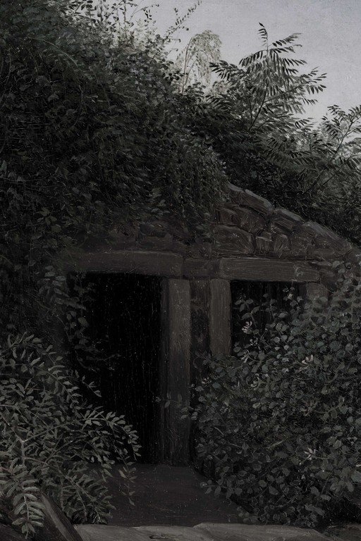 Overgrown Stone Structure with Dark Entrances