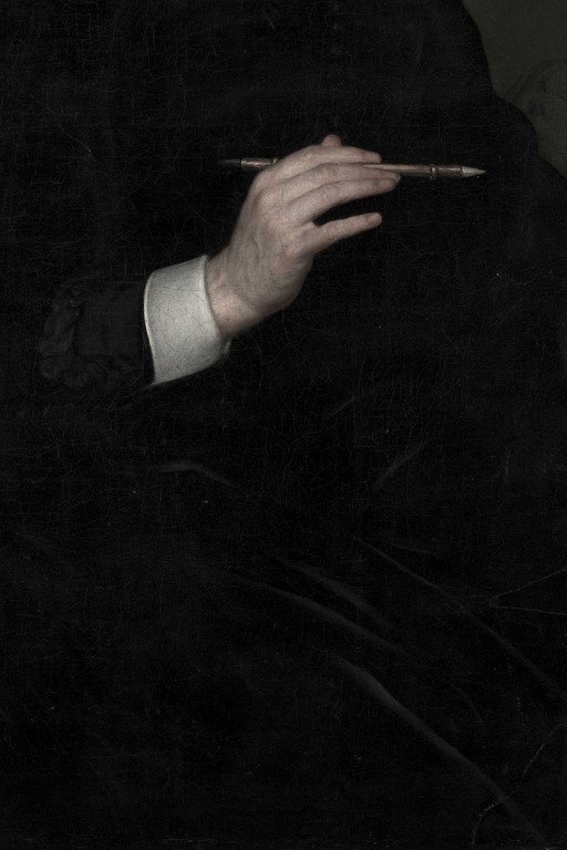 Man's Hand Holding a Quill Pen