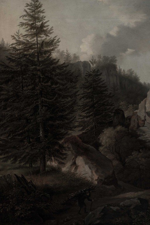 Man Carrying Firewood Through Dark Forest Landscape