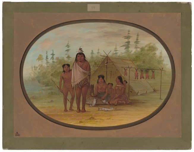 Indigenous People in a Camp with a Tent and Drying Fish