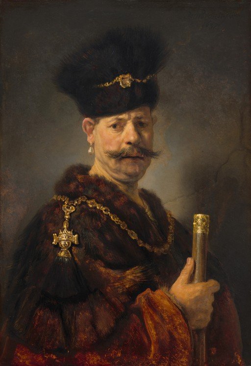 Man in Fur Hat and Robe Holding a Cane