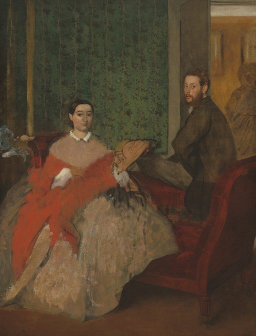 Portrait of a Couple in a Red Sofa