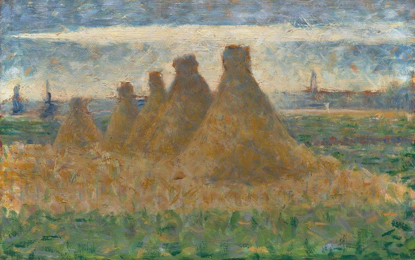 Haystacks in a Field at Dusk