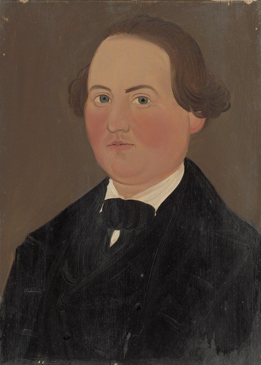 Portrait of a Man in a Black Suit