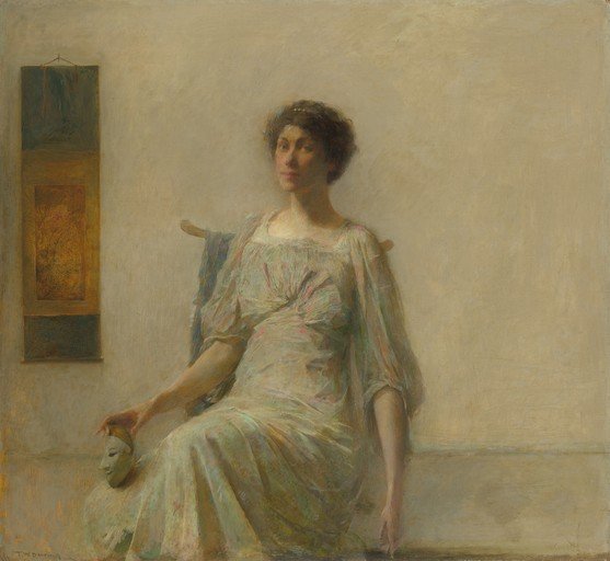 Woman Holding a Mask