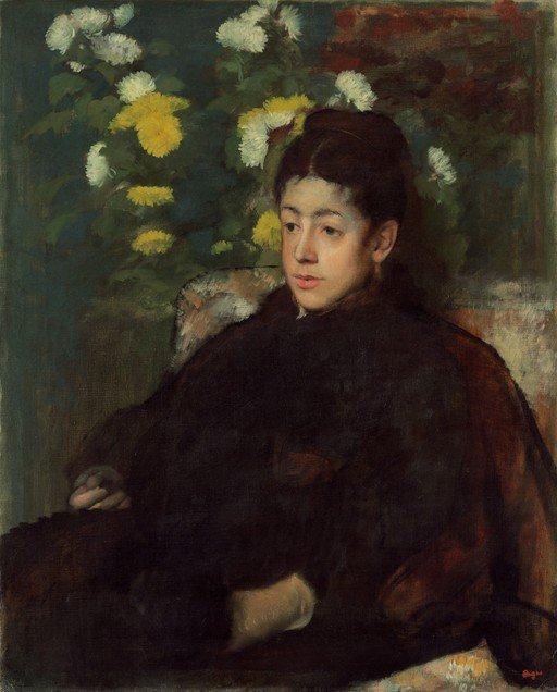 Woman with Chrysanthemums by Berthe Morisot