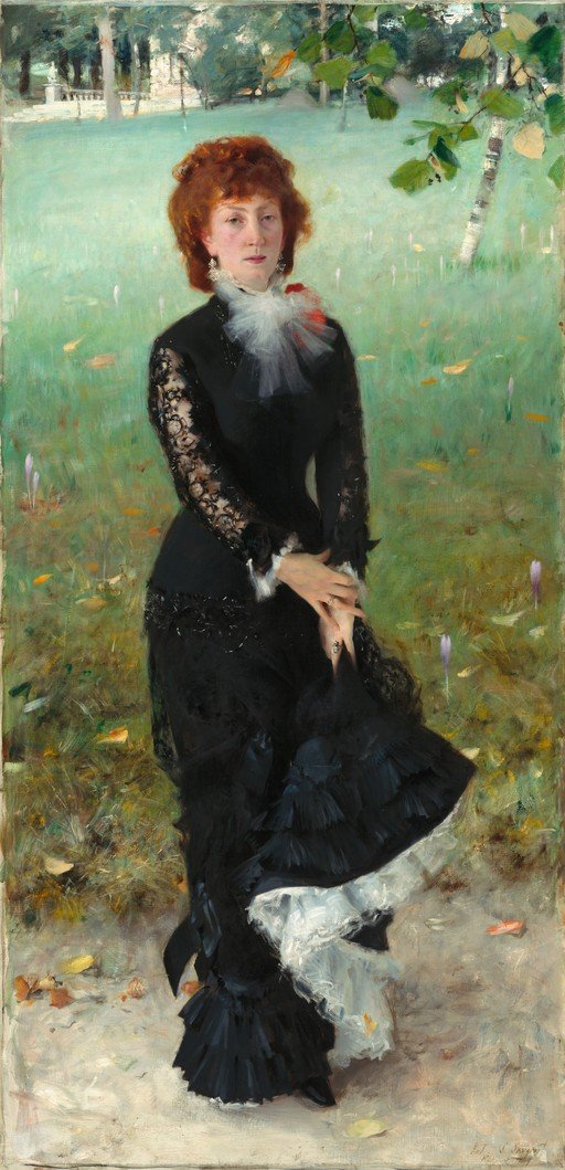 Woman in Black Lace Dress in a Garden