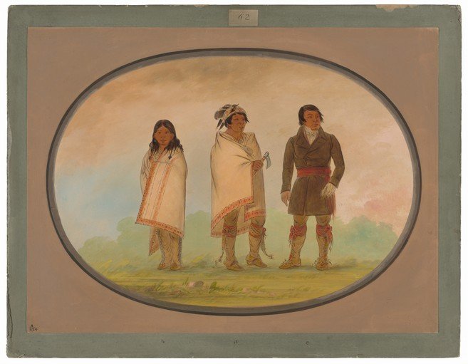 Three Native American individuals in traditional attire