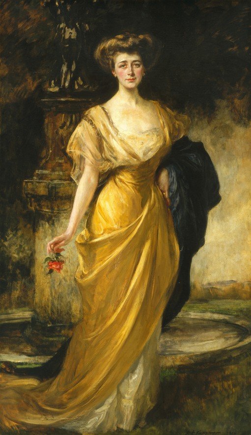 Elegant Woman in Yellow Gown Holding a Rose