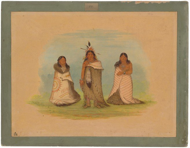 Three Native American individuals in traditional attire