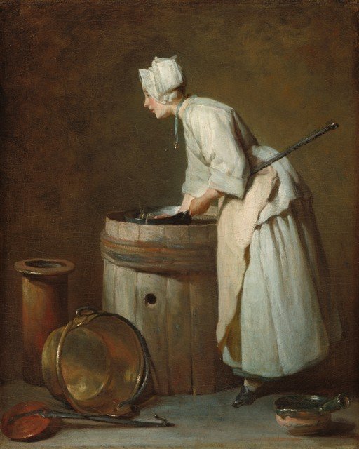 Woman in Kitchen Preparing Food