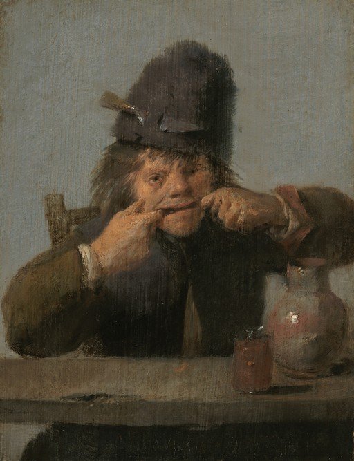 Man in Fur Hat Making a Face