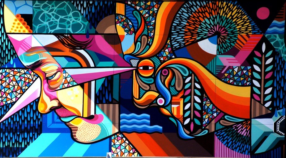 Vibrant Geometric Mural with Abstract Human Face