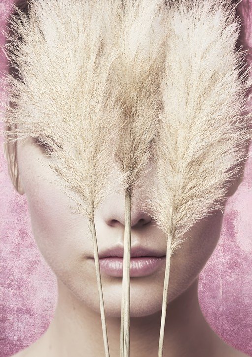 Woman's Face Partially Obscured by Pampas Grass