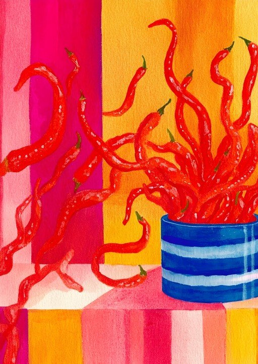 Vibrant Red Chili Peppers in a Blue Striped Pot