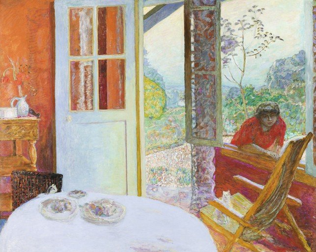 Woman in Red Overlooking a Garden