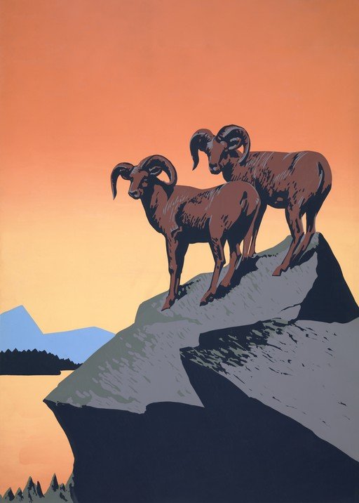 Bighorn Sheep on Rocky Outcrop at Sunset