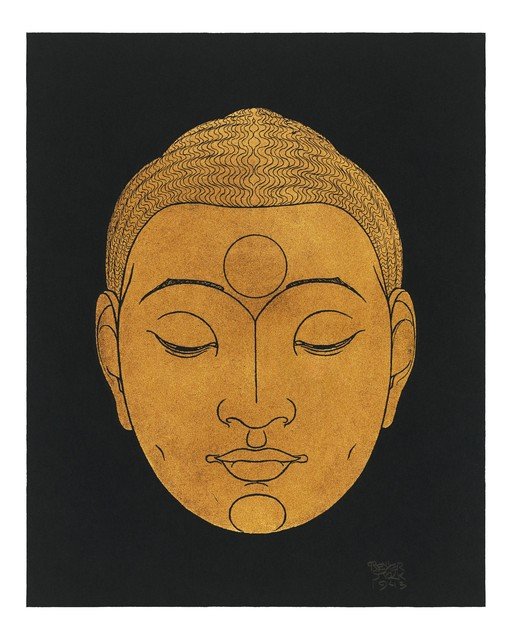 Golden Buddha Face on Black Background