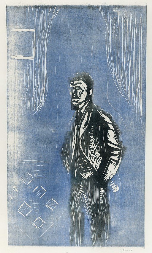 Man in a Suit Standing in a Room