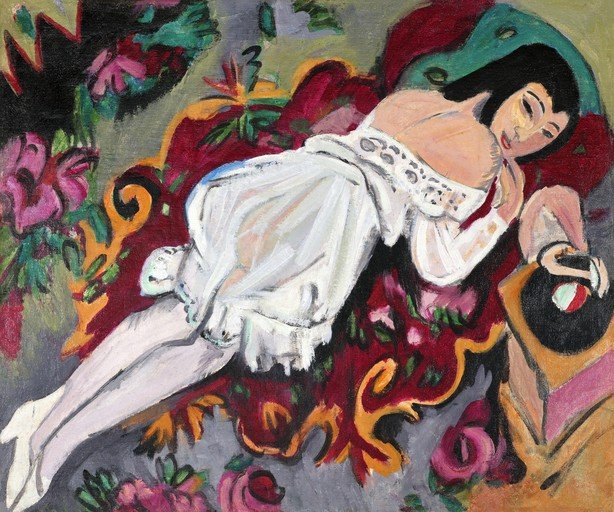 Woman in White Dress Reclining on a Red Sofa