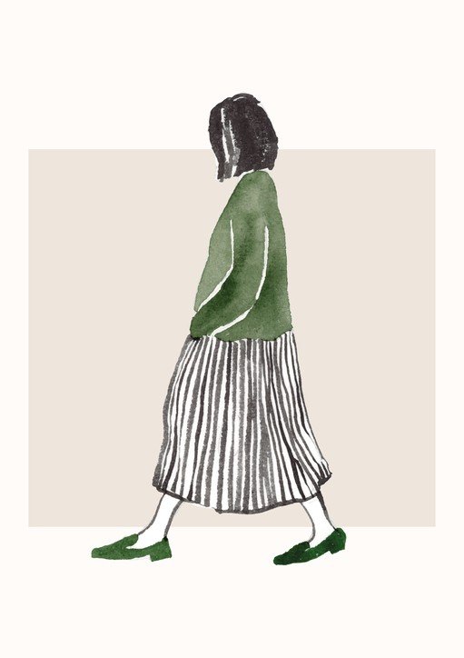 Woman in Green Sweater and Striped Skirt Walking
