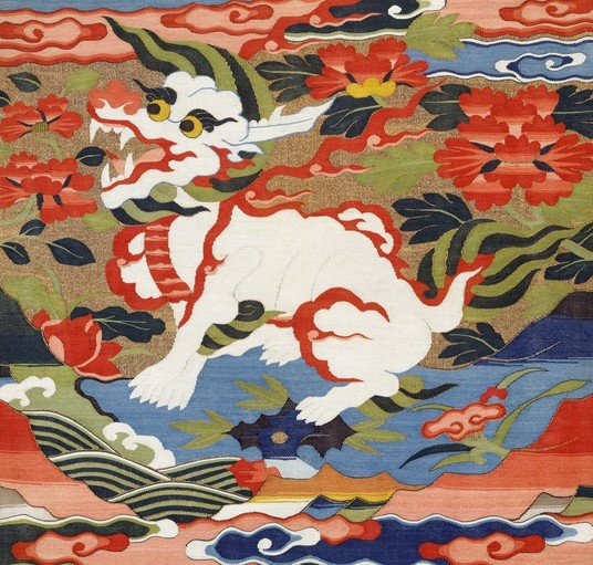 Tibetan Textile Art: Mythical Beast Amidst Floral and Cloud Motifs