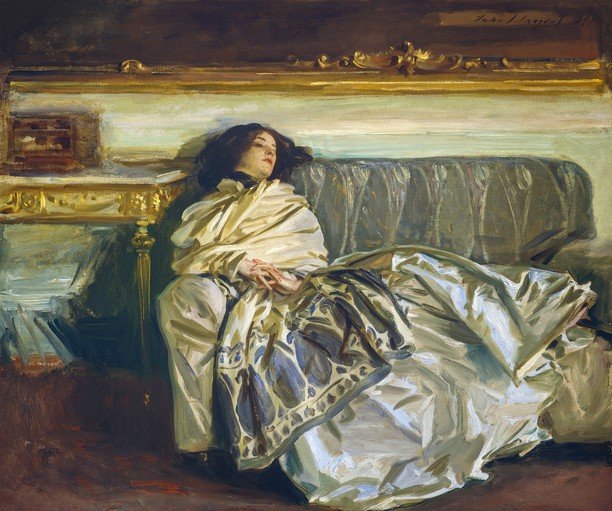 Woman in White Shawl Resting on a Sofa