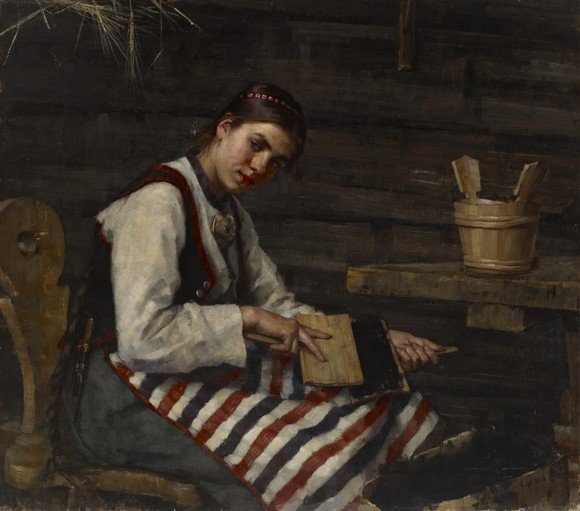 Young Woman Working in a Rustic Interior
