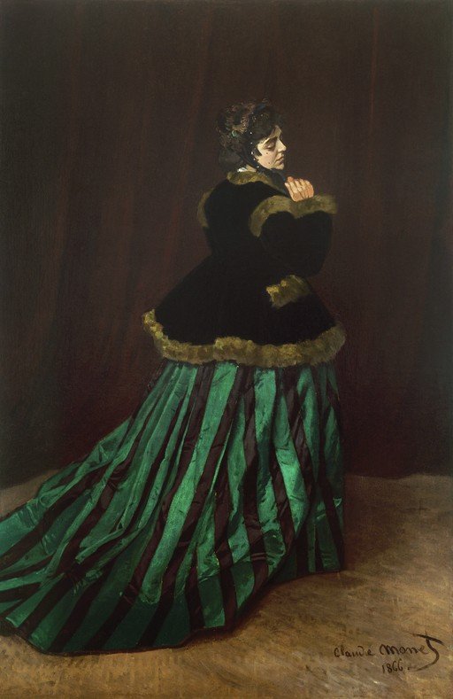 Woman in a Green and Black Striped Dress