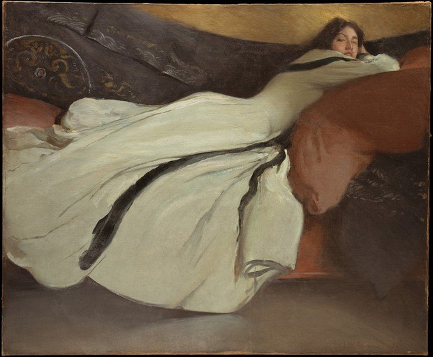 Woman in White Dress Reclining on Sofa