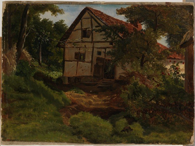 Half-Timbered House Amidst Lush Greenery