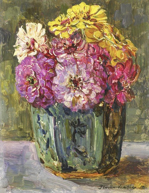 Vibrant Zinnias in a Decorative Vase