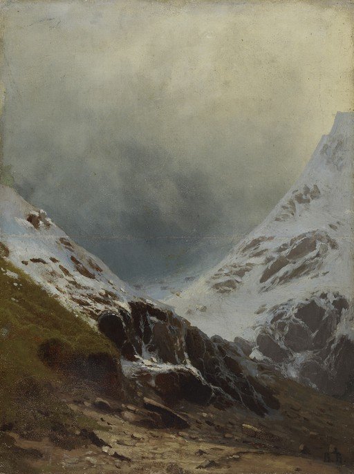 Snow-Dusted Mountain Valley Under a Cloudy Sky