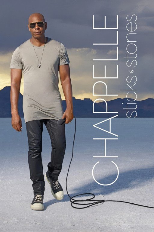 Dave Chappelle Stands on Salt Flats with Microphone