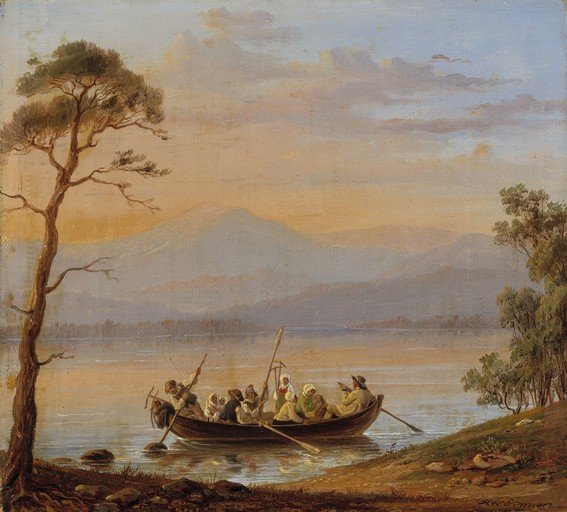 People in a rowboat on a lake at sunset