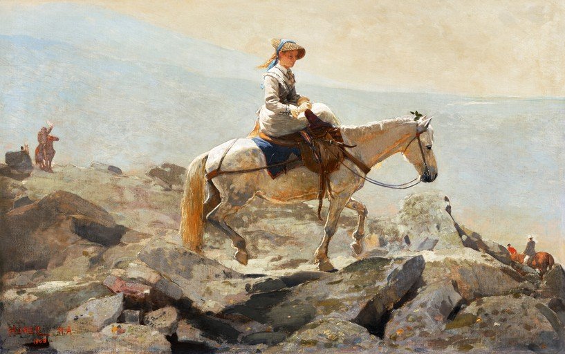 Woman on Horseback Navigating Rocky Terrain