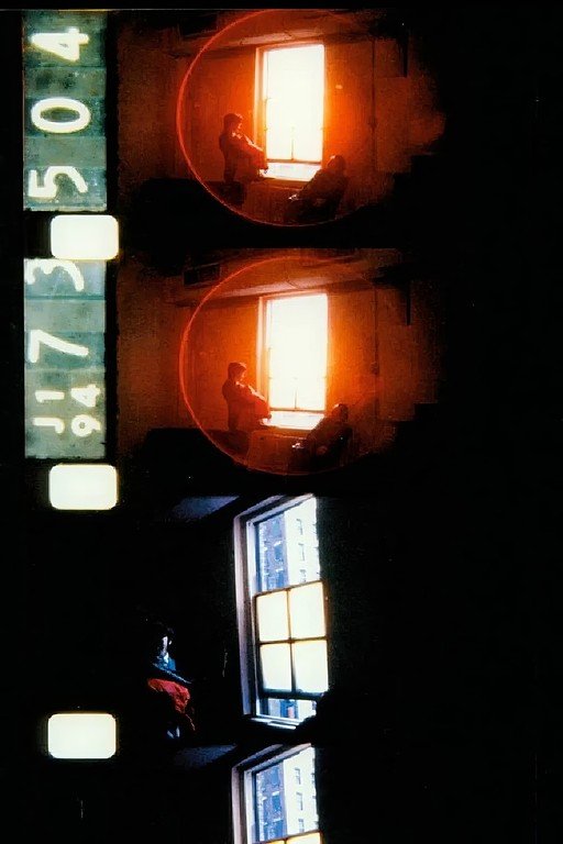 Film Strip with Figures by Window Light