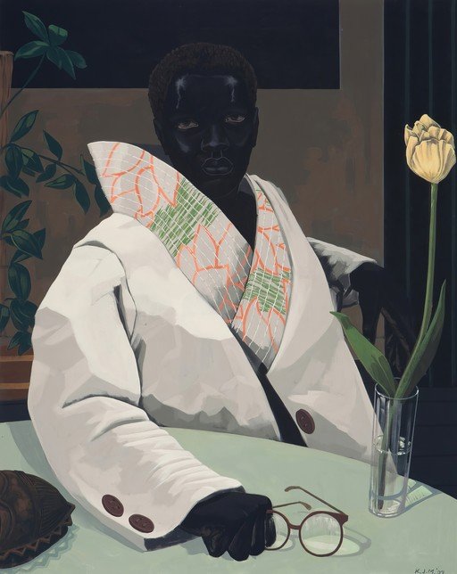 Portrait of a person in a white jacket with a tulip
