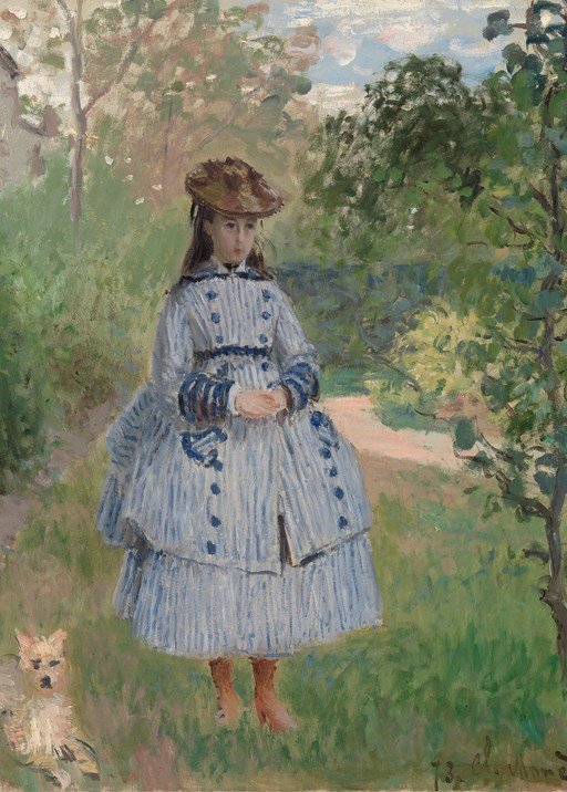 Young Girl in a Striped Dress with a Dog in a Garden