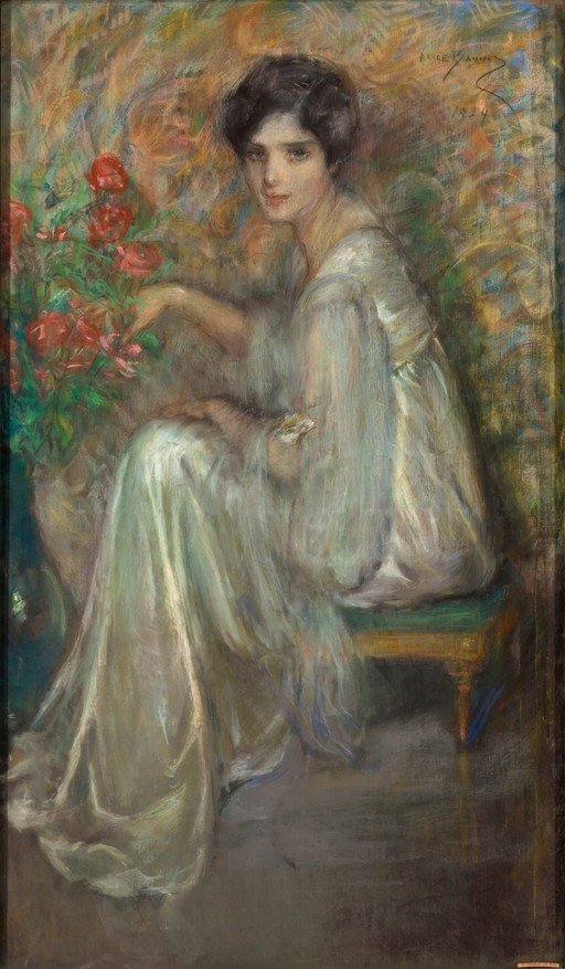 Woman in a flowing gown with roses